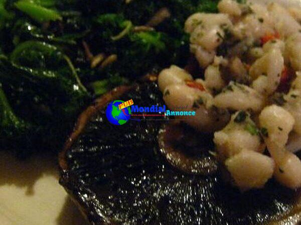 Inviting Sauteed Kale with Pan Roasted Garlic, Currants and Solar Flower Seeds (Vegan, gluten free)