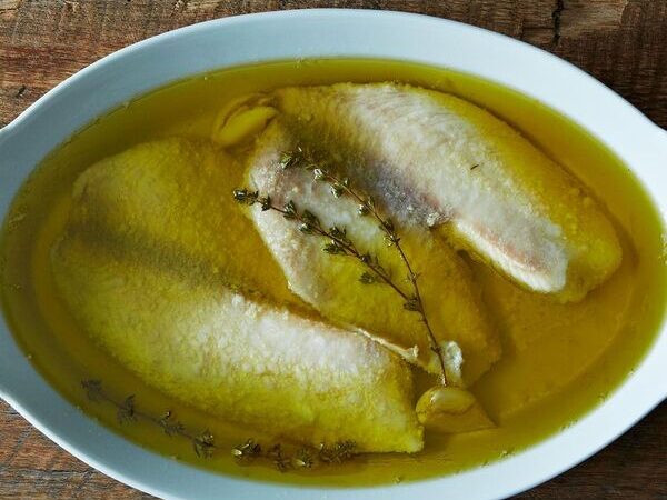 Tilapia Poached in Olive Oil with Thyme and Garlic